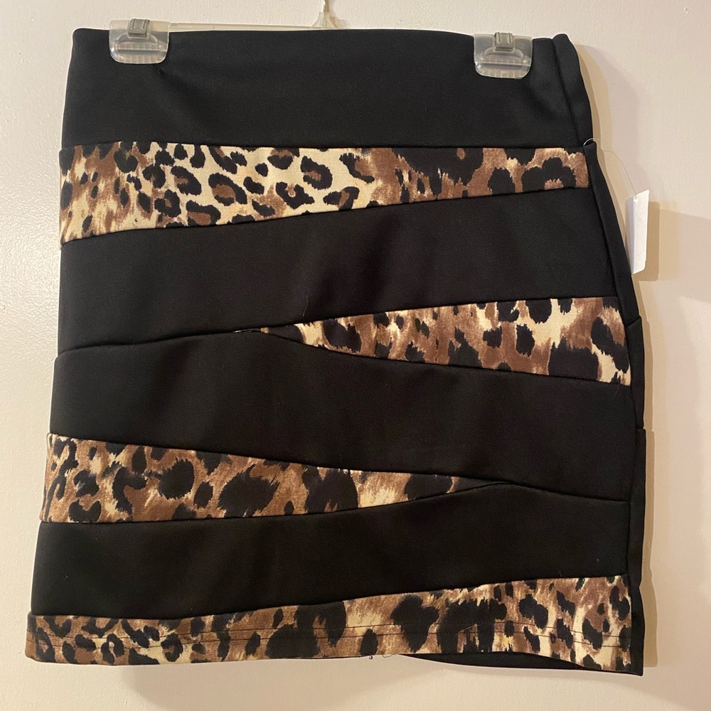 Leopard and black skirt